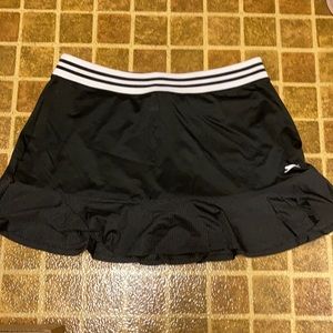 Puma golfing skort, size large with a back pocket.